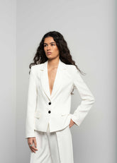 Pantalón de Pinzas Blanco: Versatilidad y Estilo en Tu Armario